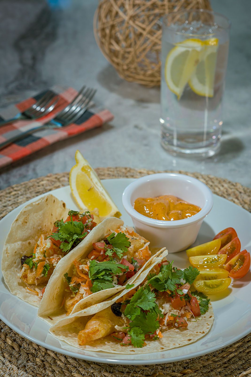 Baja fish tacos with pico de gallo, salsa and lime